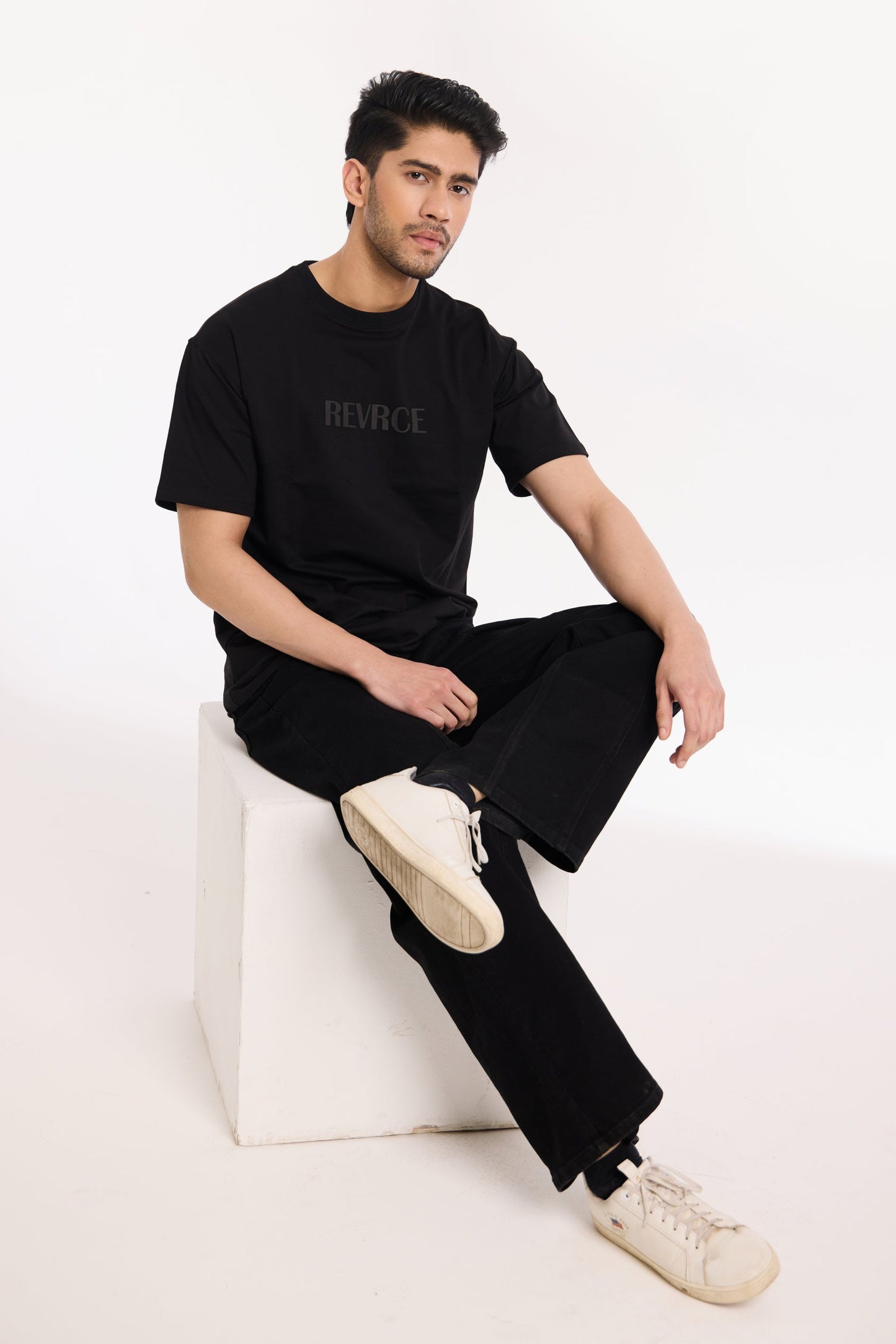 Alternate angle of Midnight Mark Solid Black Tee by Revrce, oversized unisex streetwear t-shirt