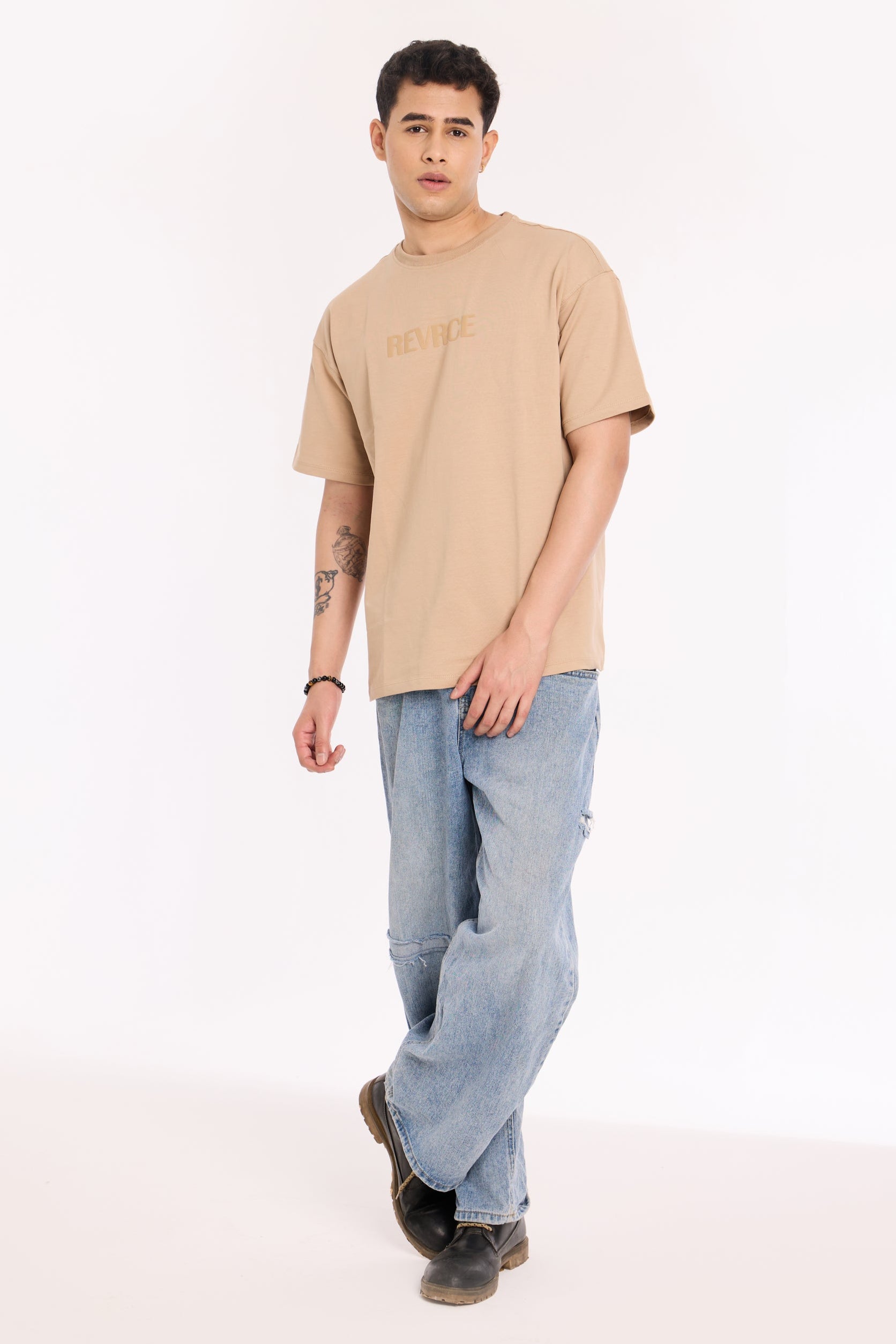 Flat lay of Sandy Silence T Shirt by Revrce, oversized streetwear t-shirt in detail