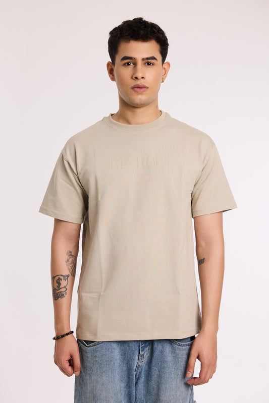 Model wearing Concrete Soul T Shirt by Revrce, oversized fit streetwear T-shirt with front graphic