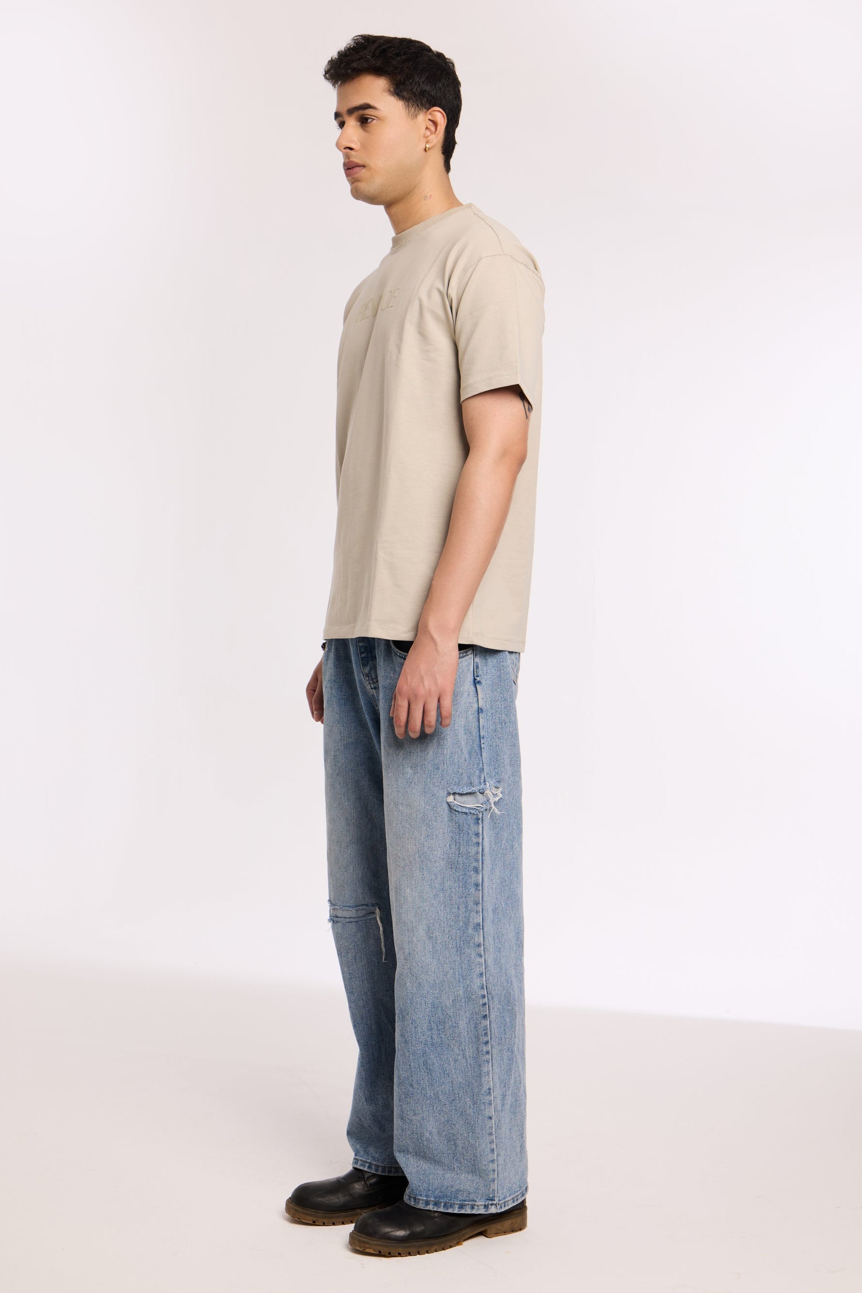 Close-up of Concrete Soul T Shirt by Revrce showing puff print or fabric texture