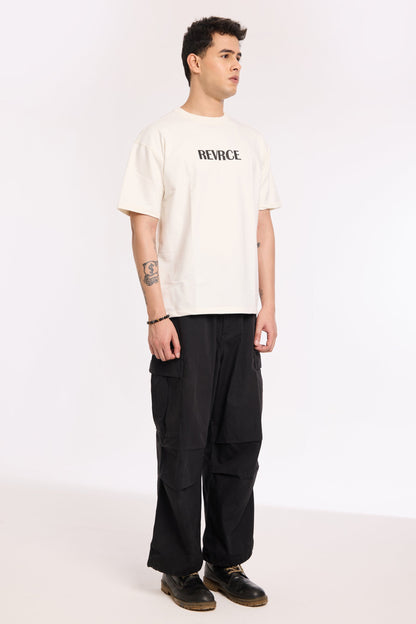 Close-up of Off White Noise T Shirt by Revrce showing puff print or fabric texture