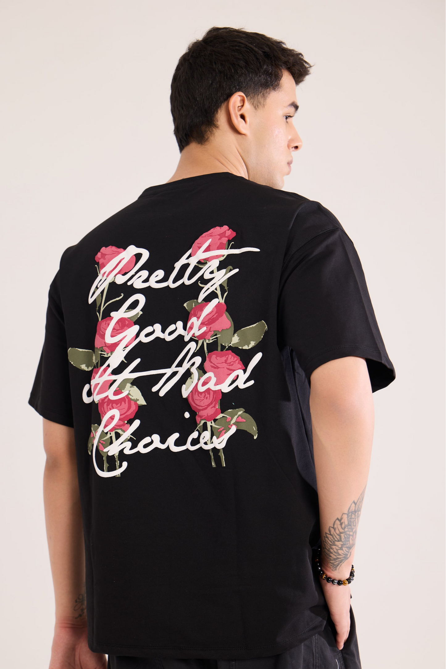 Close-up of Pretty Good T Shirt by Revrce showing puff print or fabric texture