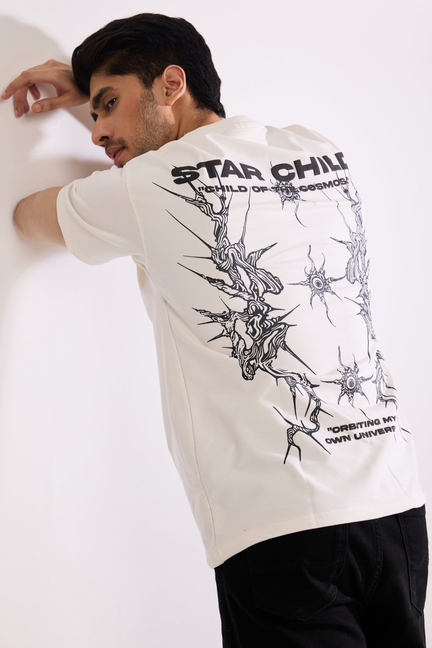 Flat lay of Star Child T Shirt by Revrce, oversized streetwear t-shirt in detail
