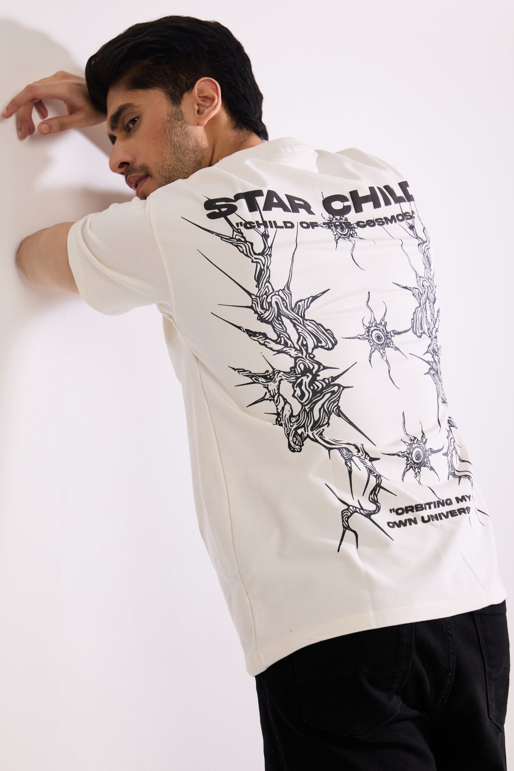Flat lay of Star Child T Shirt by Revrce, oversized streetwear t-shirt in detail