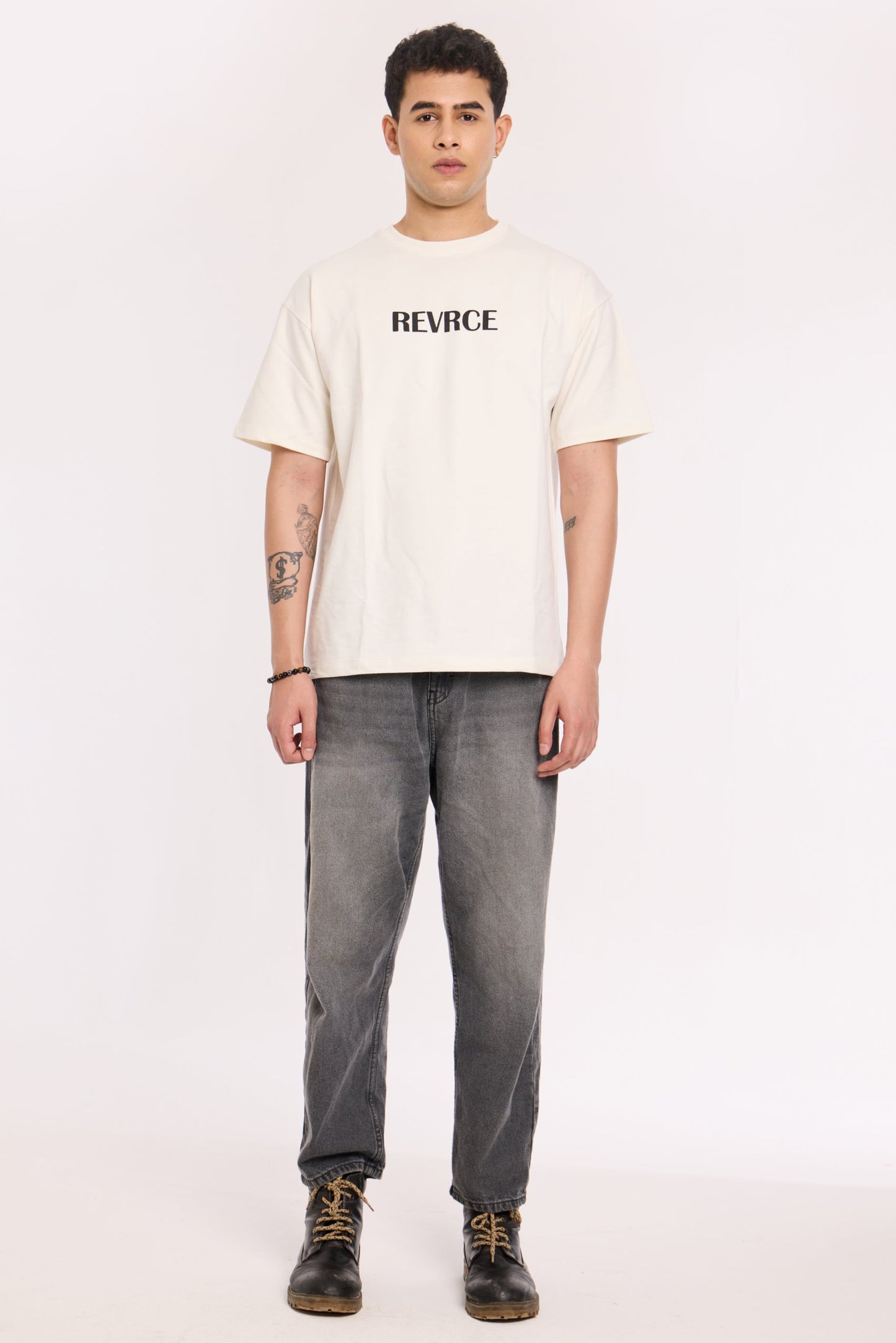 Model wearing Star Child T Shirt by Revrce, oversized fit streetwear T-shirt with front graphic