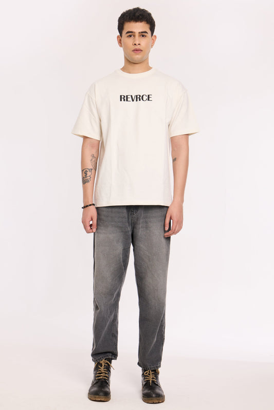 Model wearing Star Child T Shirt by Revrce, oversized fit streetwear T-shirt with front graphic
