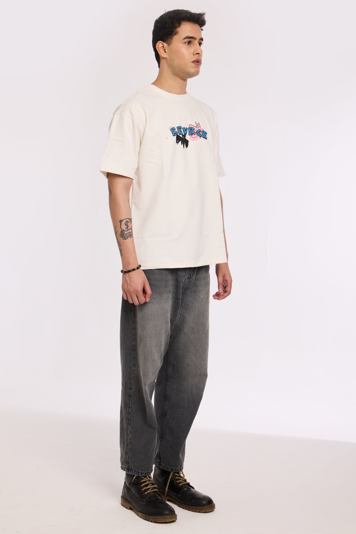 Close-up of Abstract Chaos T Shirt by Revrce showing puff print or fabric texture