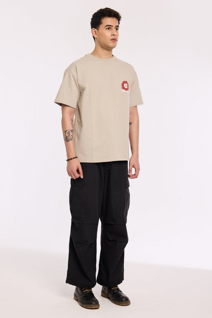 Close-up of Concrete Beyond Time T Shirt by Revrce showing puff print or fabric texture