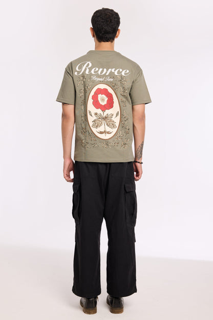Flat lay of Olive Beyond Time T Shirt by Revrce, oversized streetwear t-shirt in detail