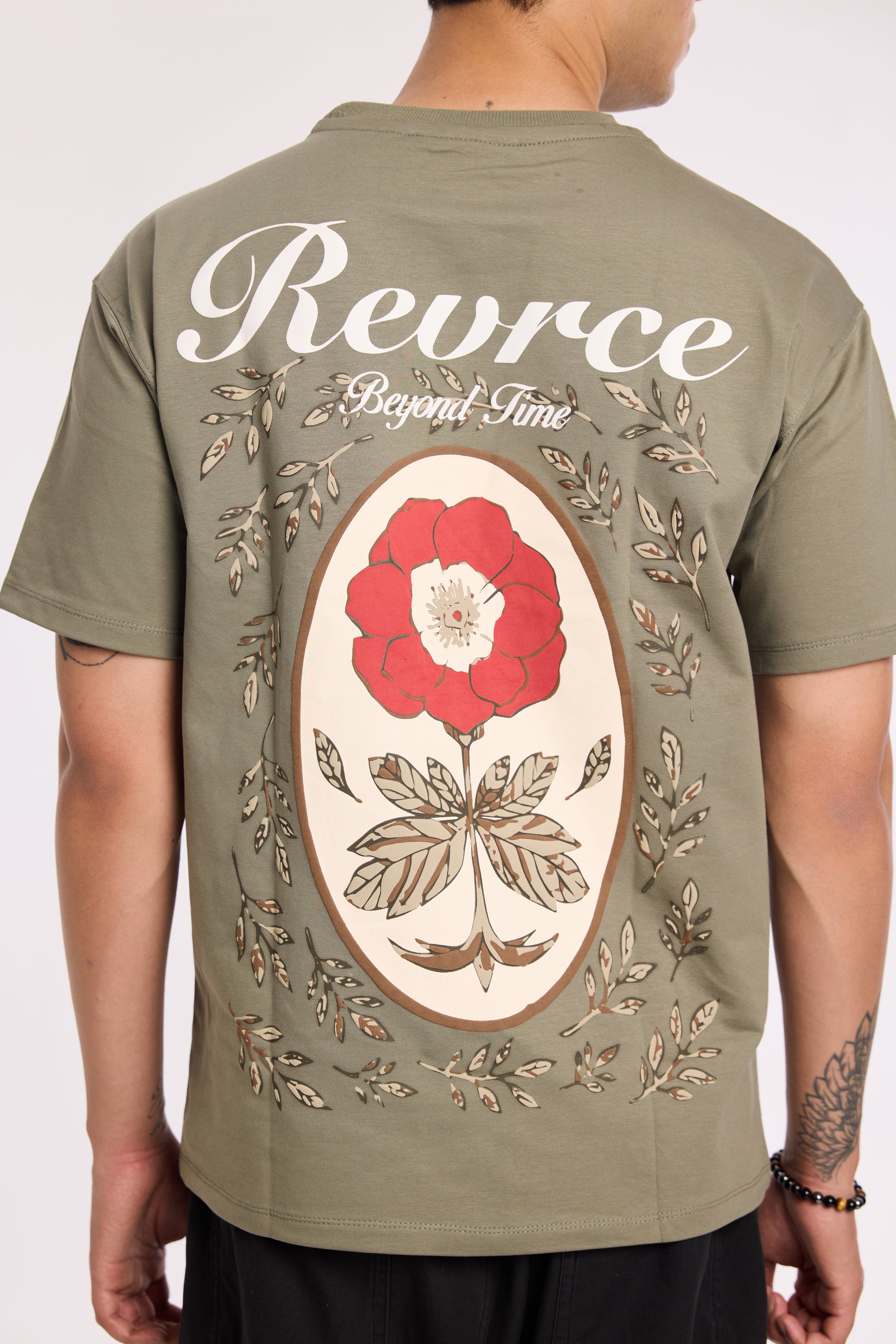 Alternate angle of Olive Beyond Time T Shirt by Revrce, oversized unisex streetwear t-shirt
